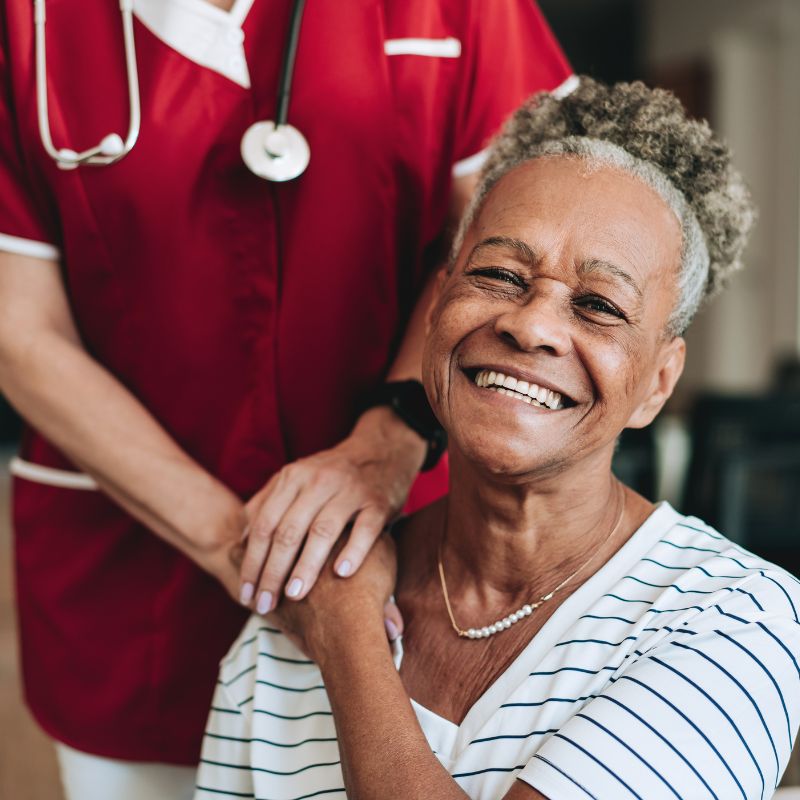 Companion carer sharing conversation and activities with a client
